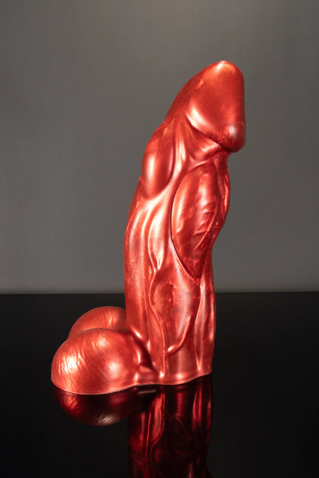 A side product photo of a red bull dildo by Twisted Beast.