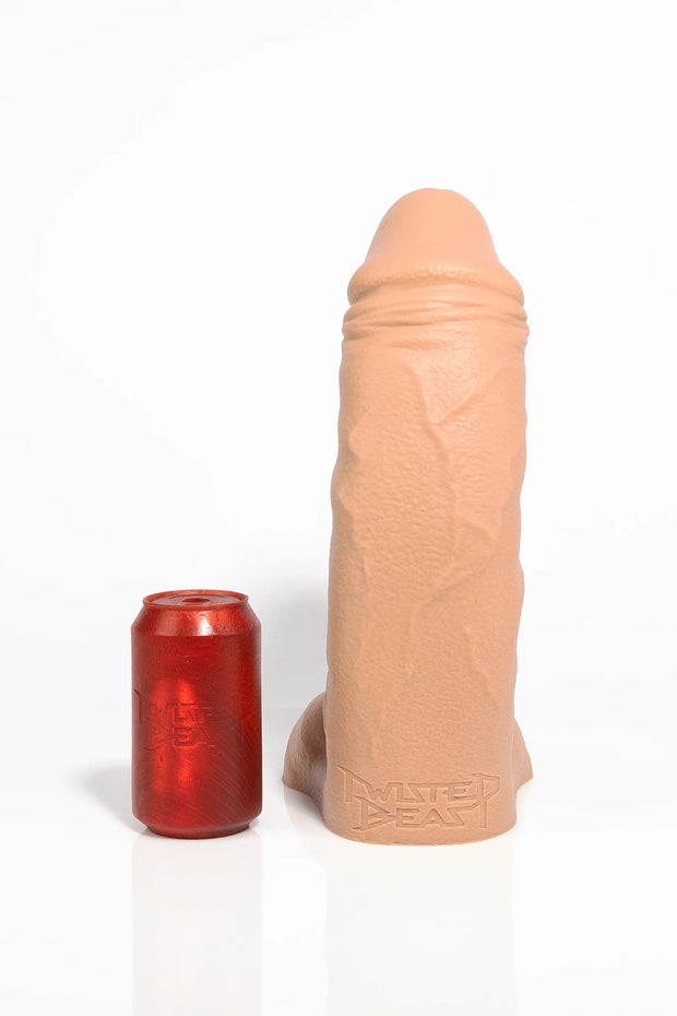 A product photo of a large tan curved dildo.