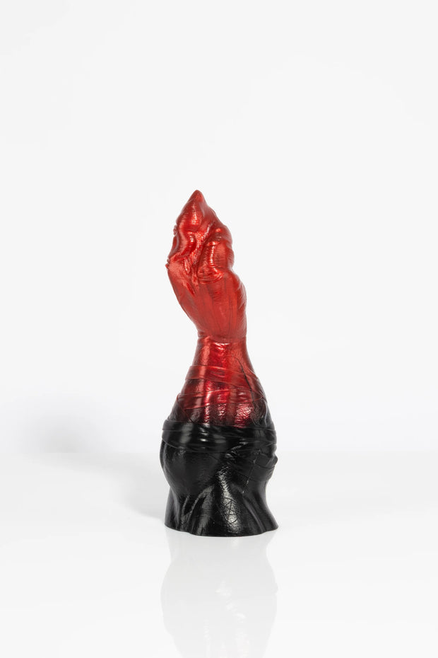 A dragon claw dildo product photo taken from an angle.