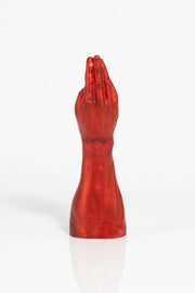 A product photo of a red fist dildo taken from behind.