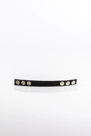 A product photo of a black trimmed black cock ring.