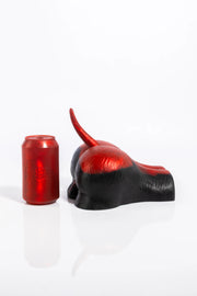 A product photo of a dog fleshlight in patch colour turned to the side.