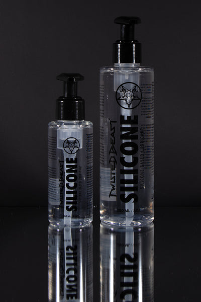 Two bottles of Perfect Glide Silicone Lube.